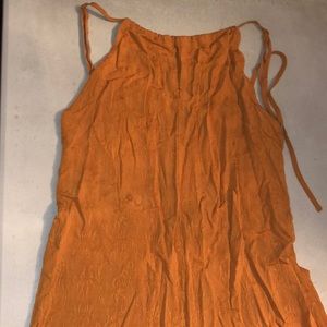Burnt orange jumpsuit, open back